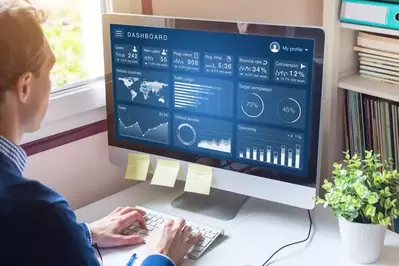 man looking at marketing results on computer