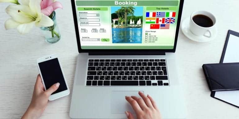 Woman booking hotel and vacation
