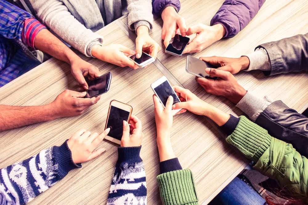 Group of people on mobile devices
